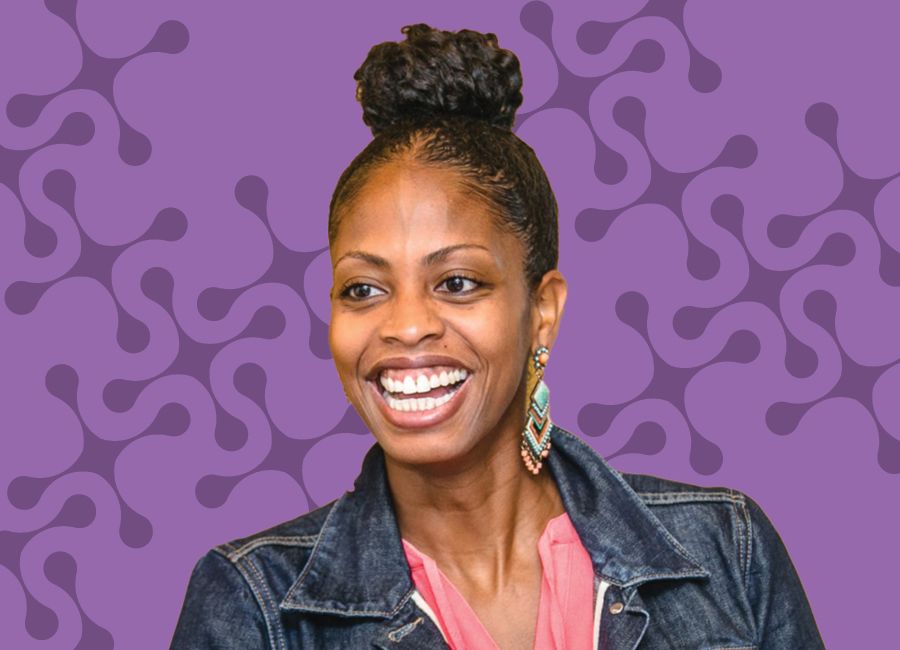 a portrait of a black woman smiling to the camera with an abstract light purple molecule background.