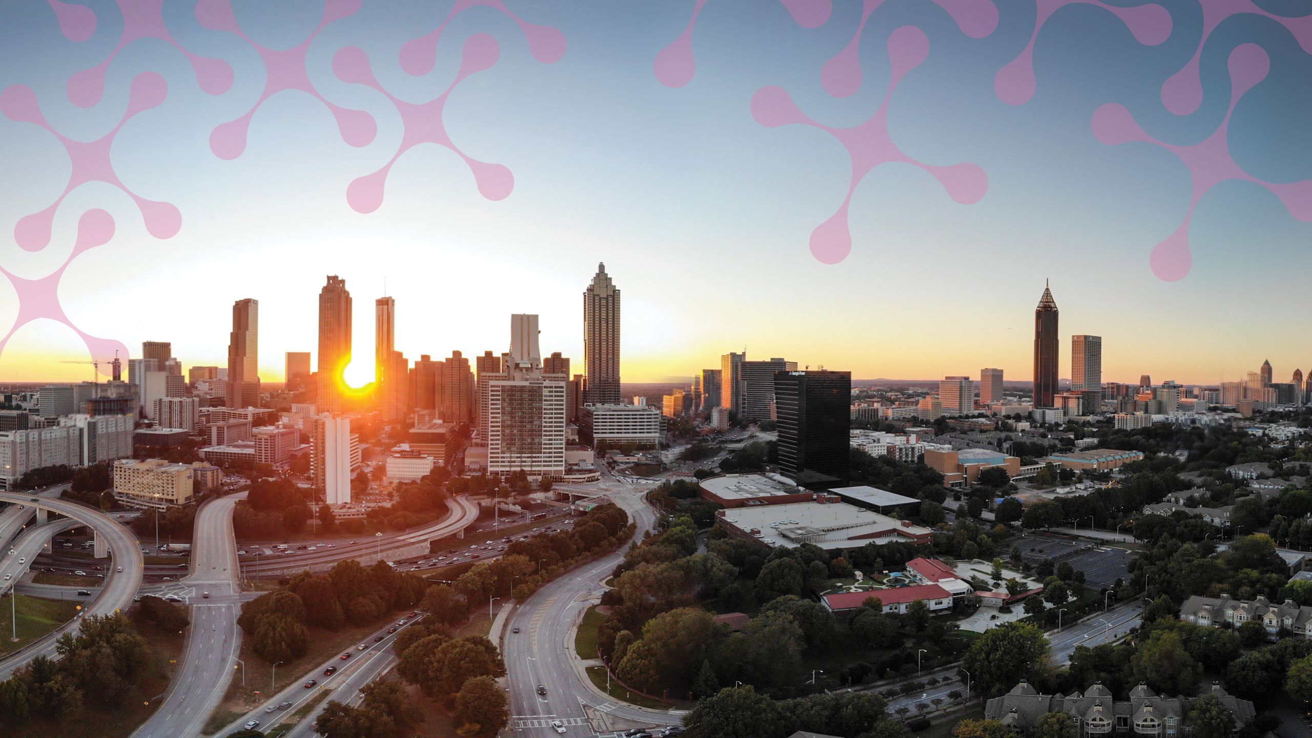 a sunset cityscape photograph of atlanta and its highways.