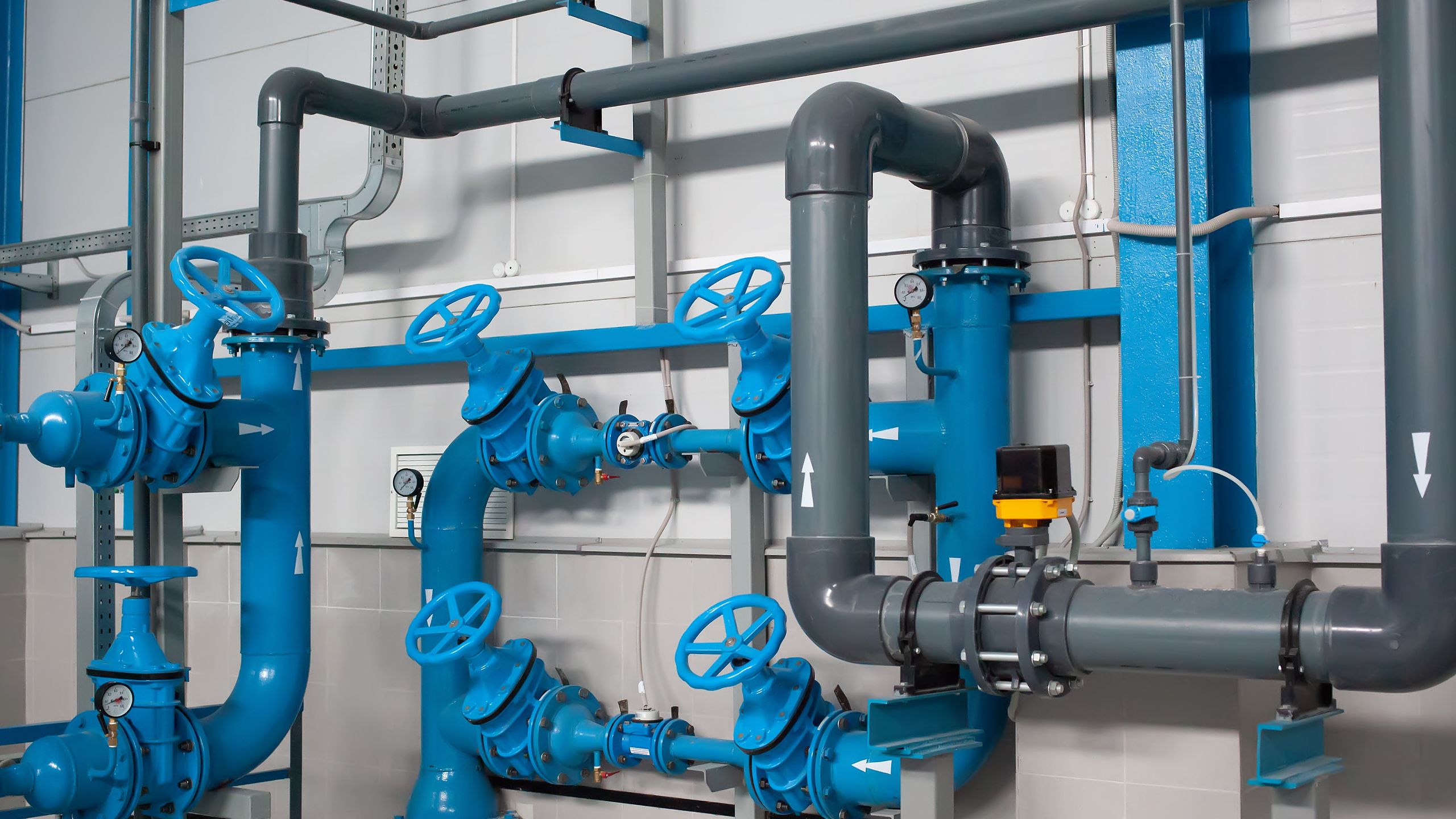 A stock photography of water pipes at a water treatment plant.