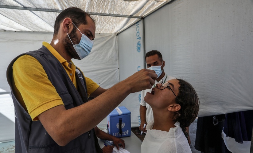 A child in Gaza receives a polio vaccination