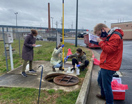 students and Anne Spaulding test wastewater at Fulton County Jail 