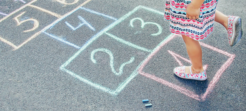 Child playing hopscotch