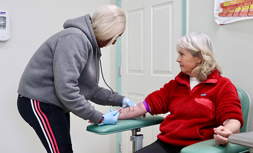 Woman giving blood