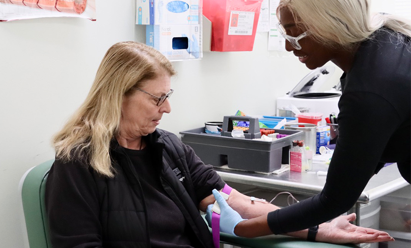 Woman giving blood