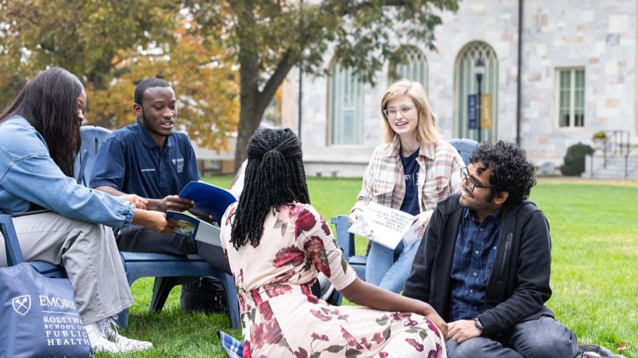 A group of Rollins students sit and chat.