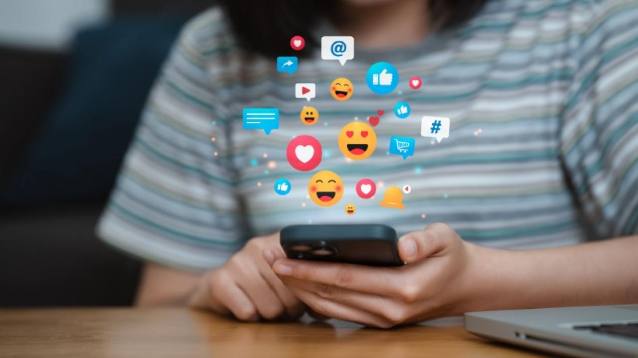 A girl using social media on her phone