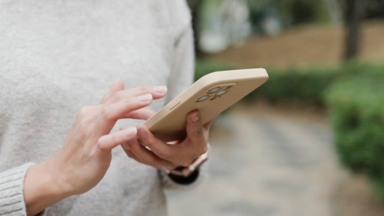 Woman looking at cell phone