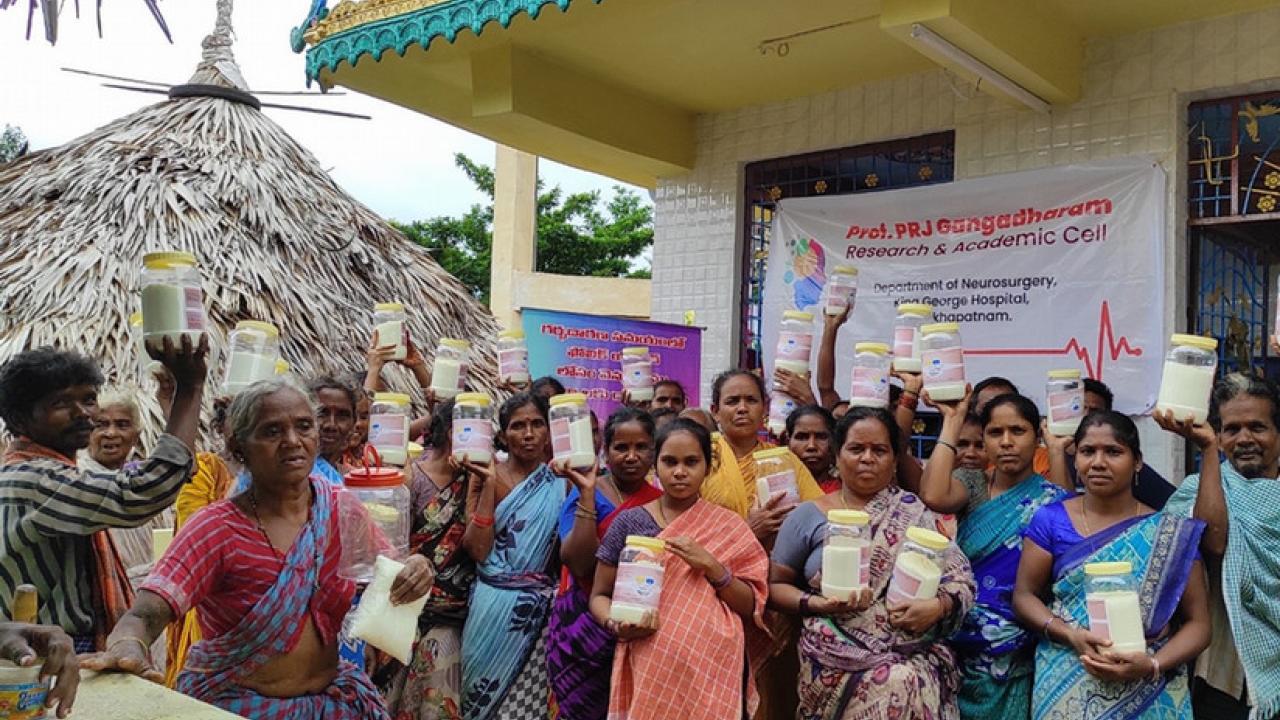 people in India holding up salt